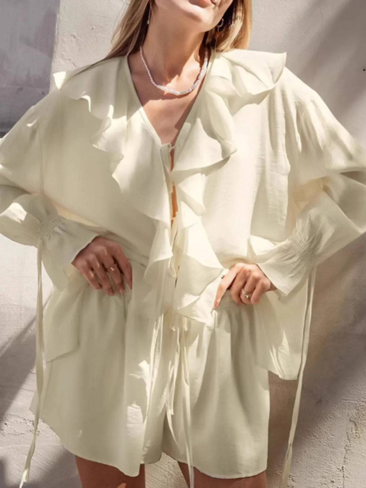 Back view of cream Ruffled V-Neck Top and Shorts Set – Voguelle