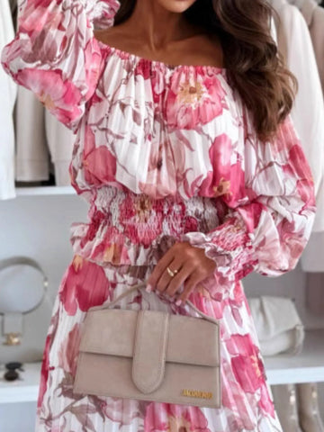 Detail shot of floral two-piece outfit showing smocked waist and soft fabric – Voguelle