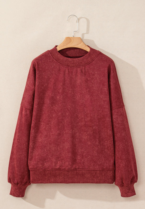 Model sitting in oversized sweatshirt – Voguelle
