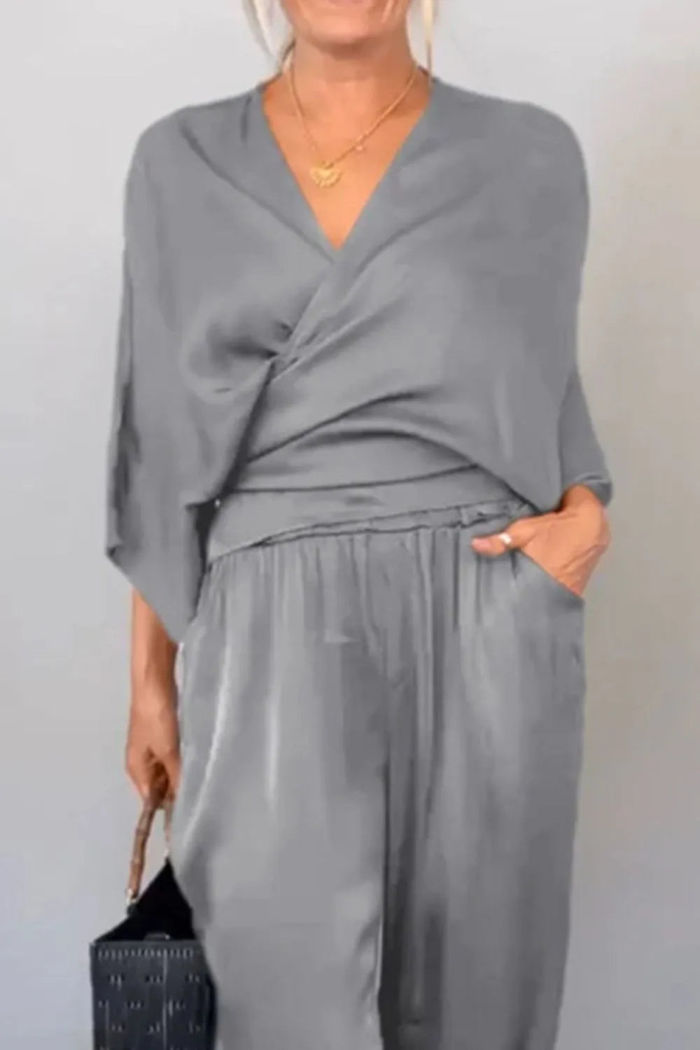 Relaxed casual wrap surplice jumpsuit in black – Voguelle