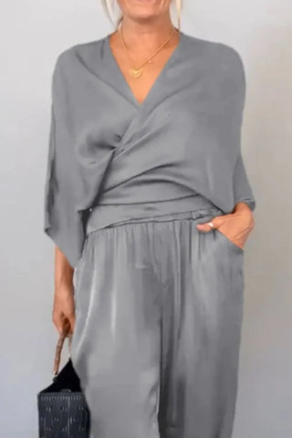 Relaxed casual wrap surplice jumpsuit in black – Voguelle