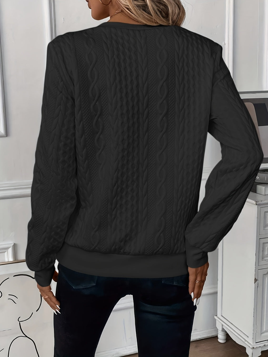 Model indoors wearing textured sweatshirt – Voguelle