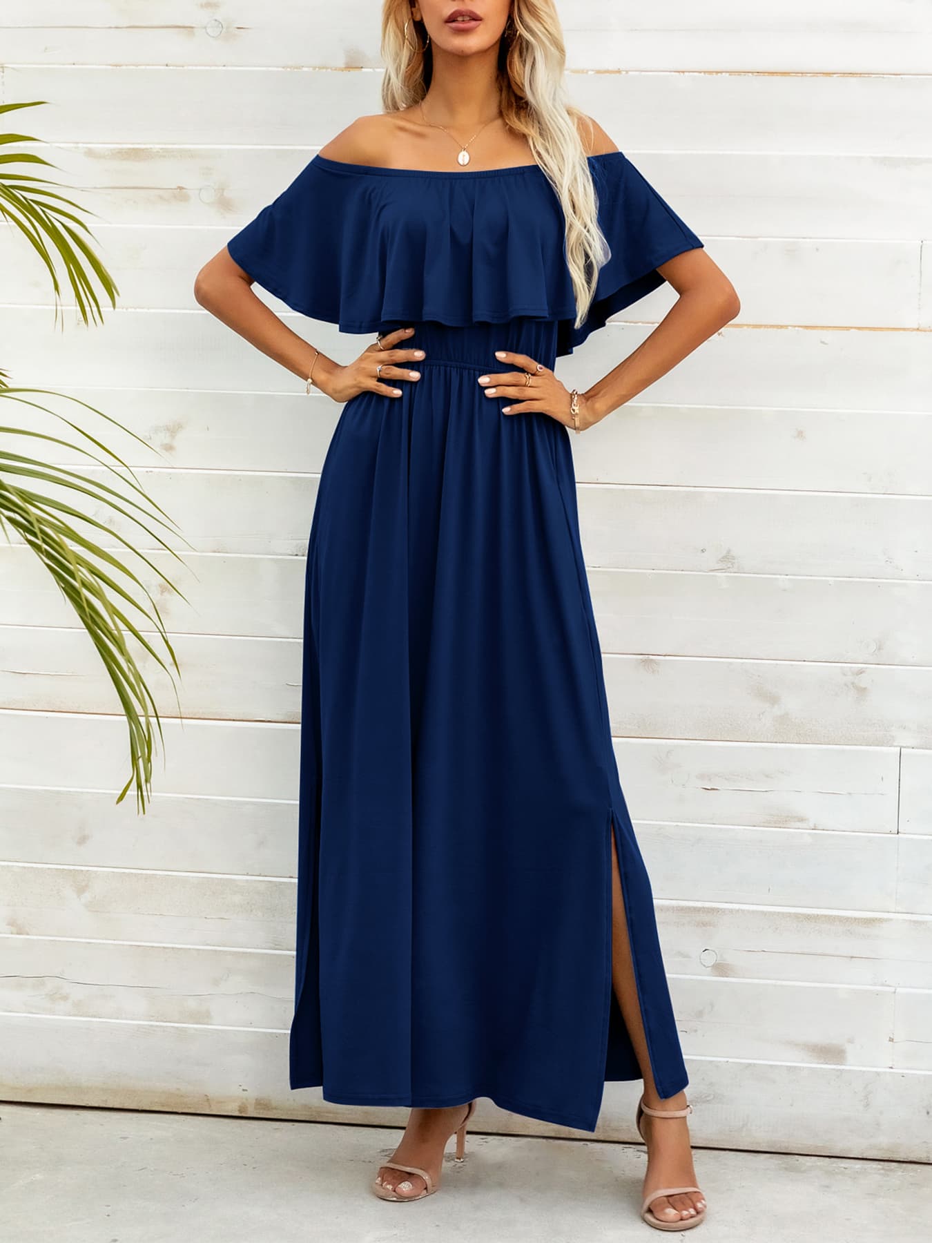 Model wearing elegant navy off-shoulder maxi dress with slit – Voguelle