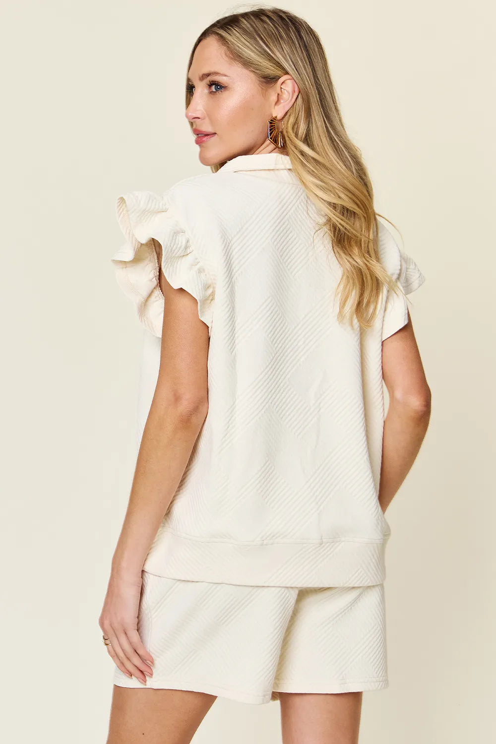 Back view cream textured co-ord set with ruffle sleeve top – Voguelle
