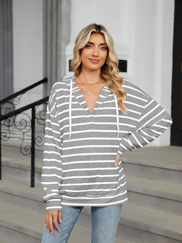 Striped drawstring hoodie styled with denim jeans – Voguelle