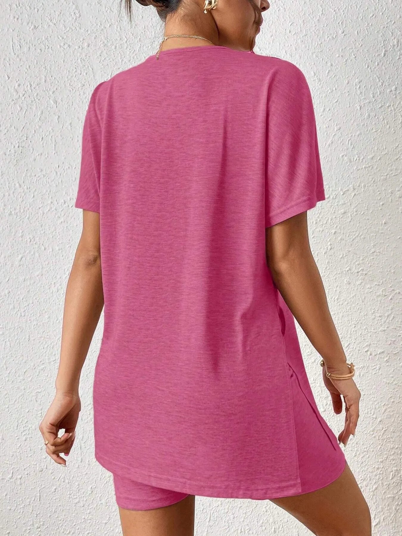 Side view of pink casual tunic top with slit hem – Voguelle