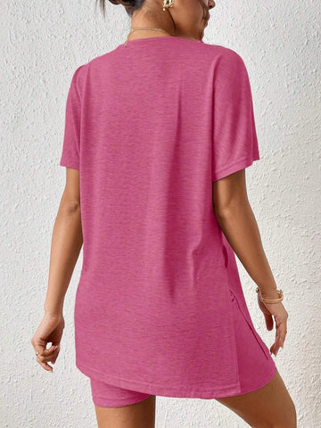 Side view of pink casual tunic top with slit hem – Voguelle