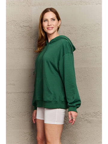 Model showcasing oversized camel hoodie with hood – Voguelle