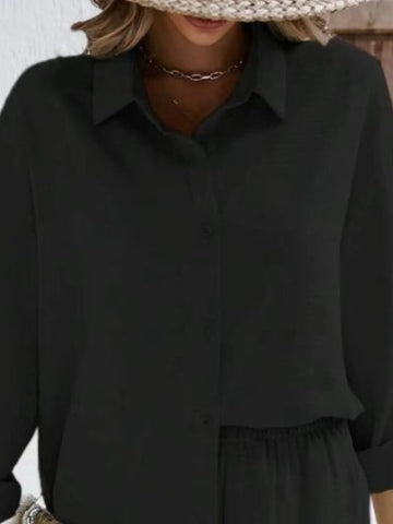 Side detail of relaxed fit button down shirt and shorts in black – Voguelle