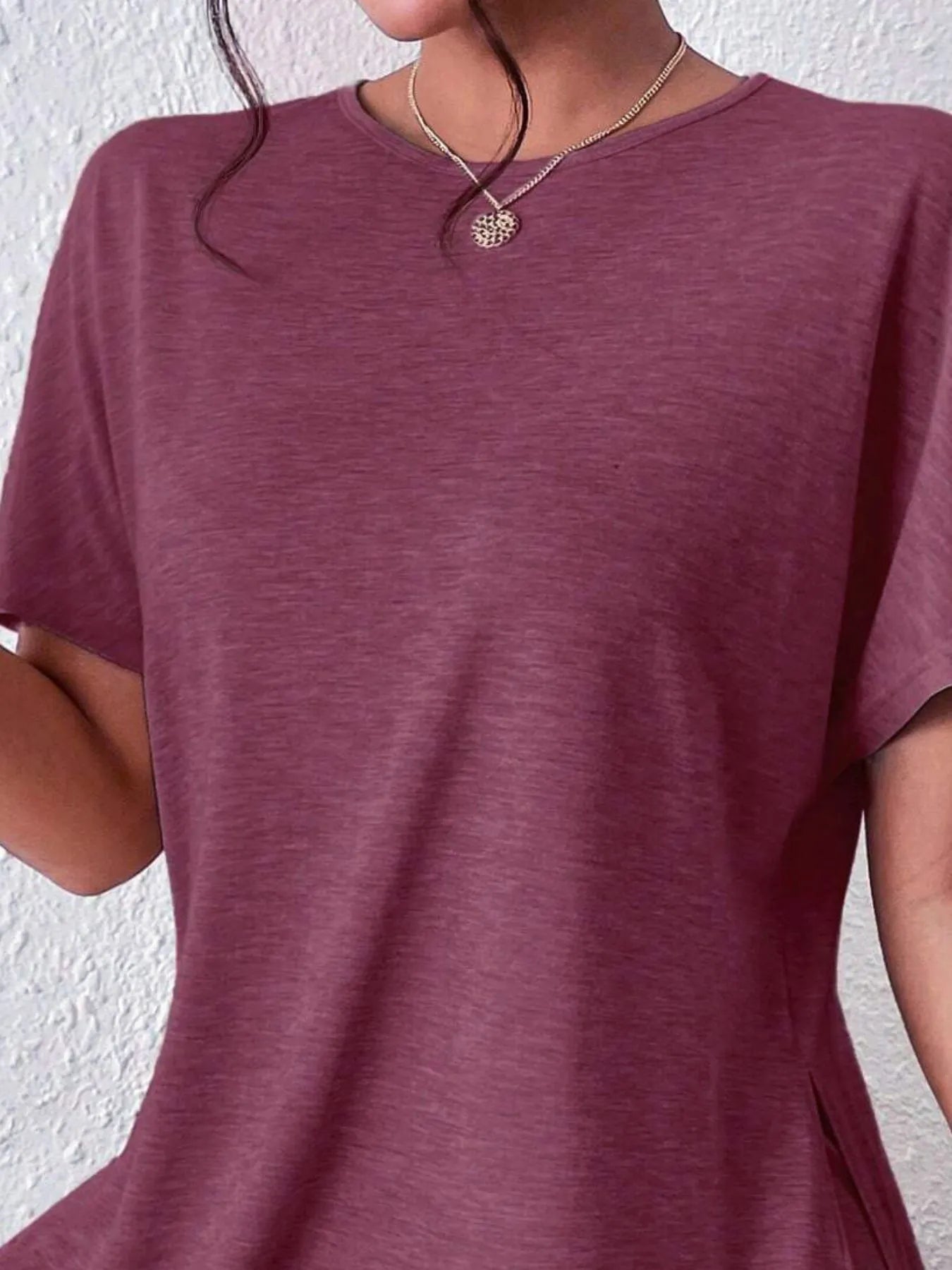 Lifestyle shot of model in pink oversized casual top – Voguelle