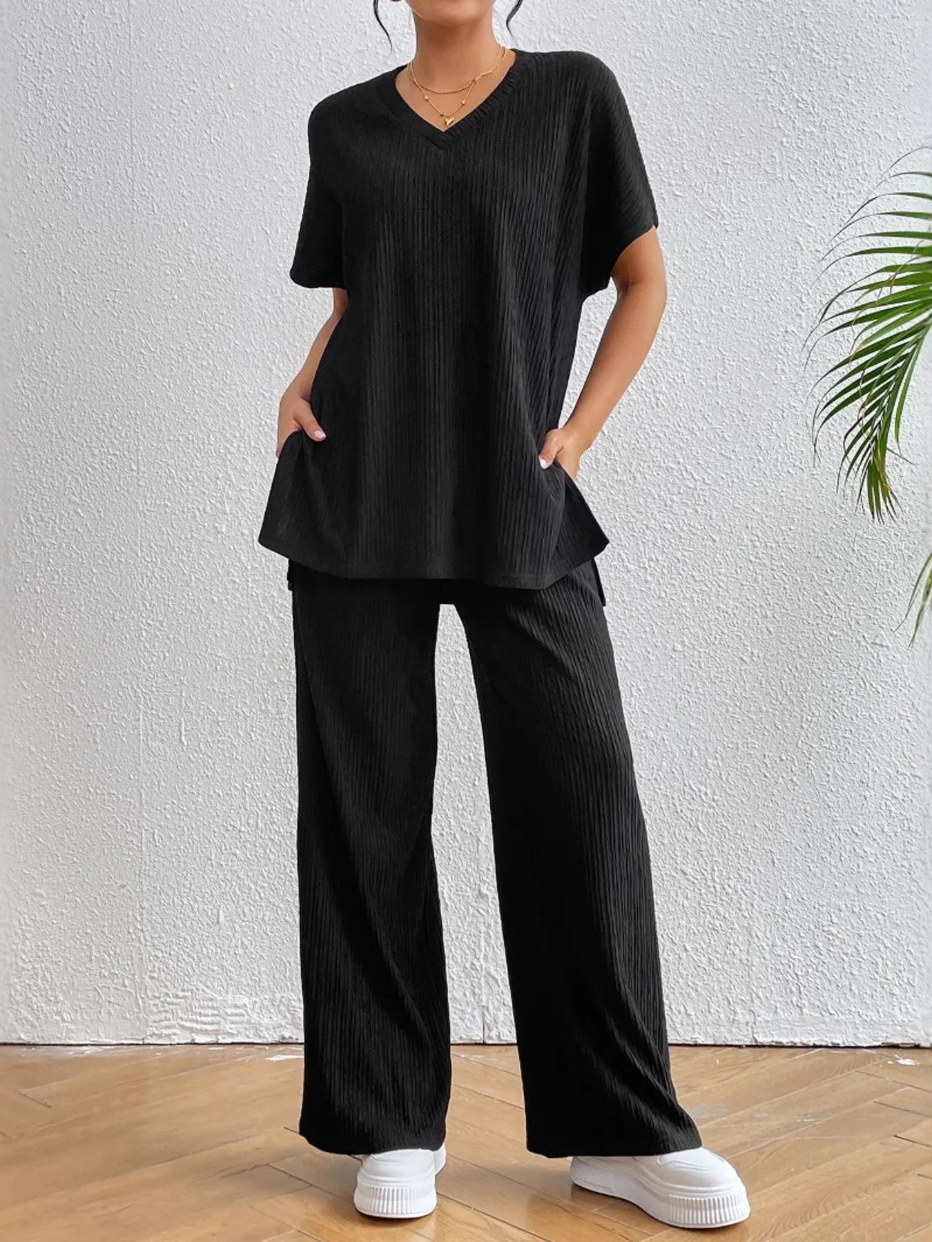 Full body look of casual black V-neck ribbed co-ord set – Voguelle