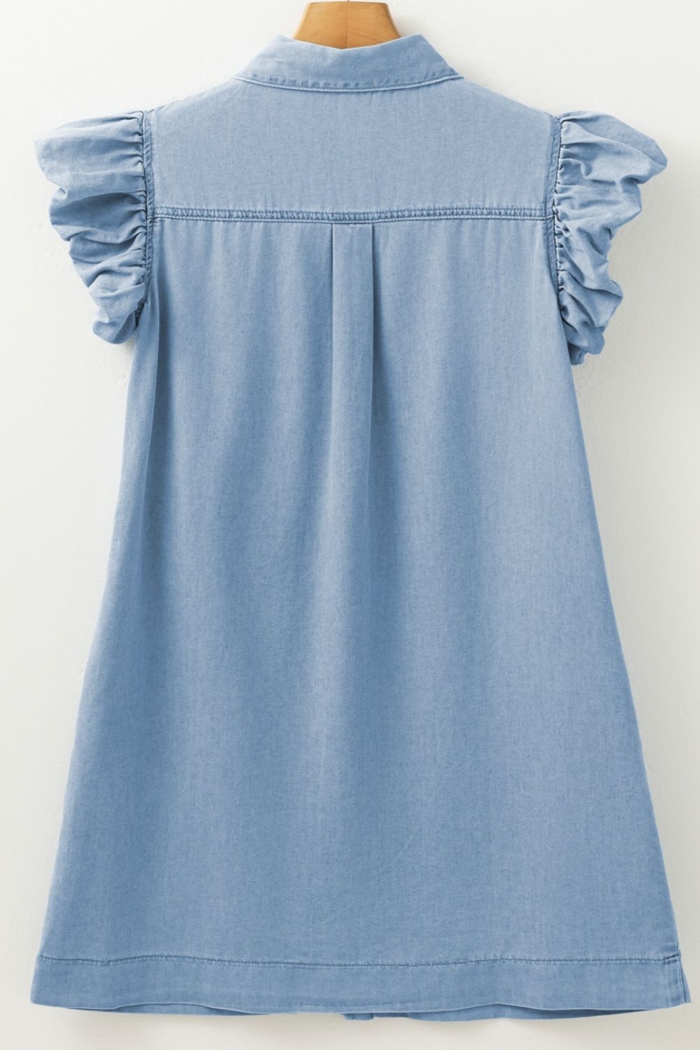 Smocked denim mini dress styled with casual accessories – Voguelle