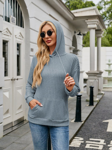 Beige ribbed hoodie shown on female model – Voguelle
