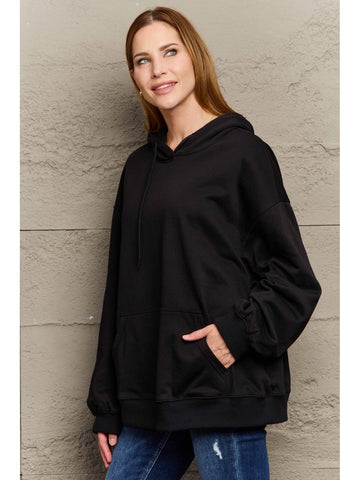 Kangaroo pocket front detail of camel hoodie – Voguelle