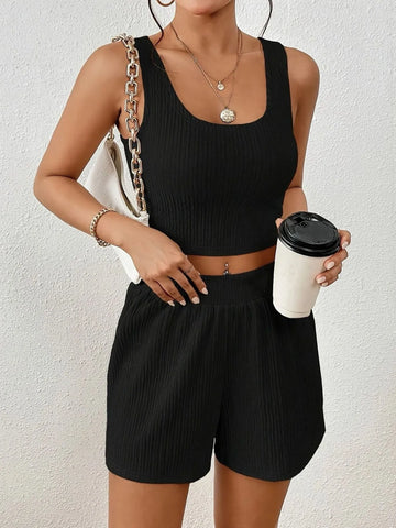 Model wearing beige Scoop Neck Ribbed Top & Shorts Set holding coffee cup – Voguelle