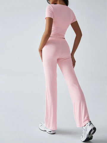 Pink ribbed crop top and drawstring waist pants set styled with sneakers – Voguelle