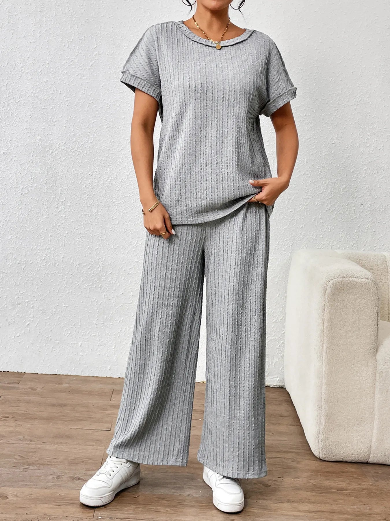 Standing look of ribbed gray round neck top and wide leg pants – Voguelle