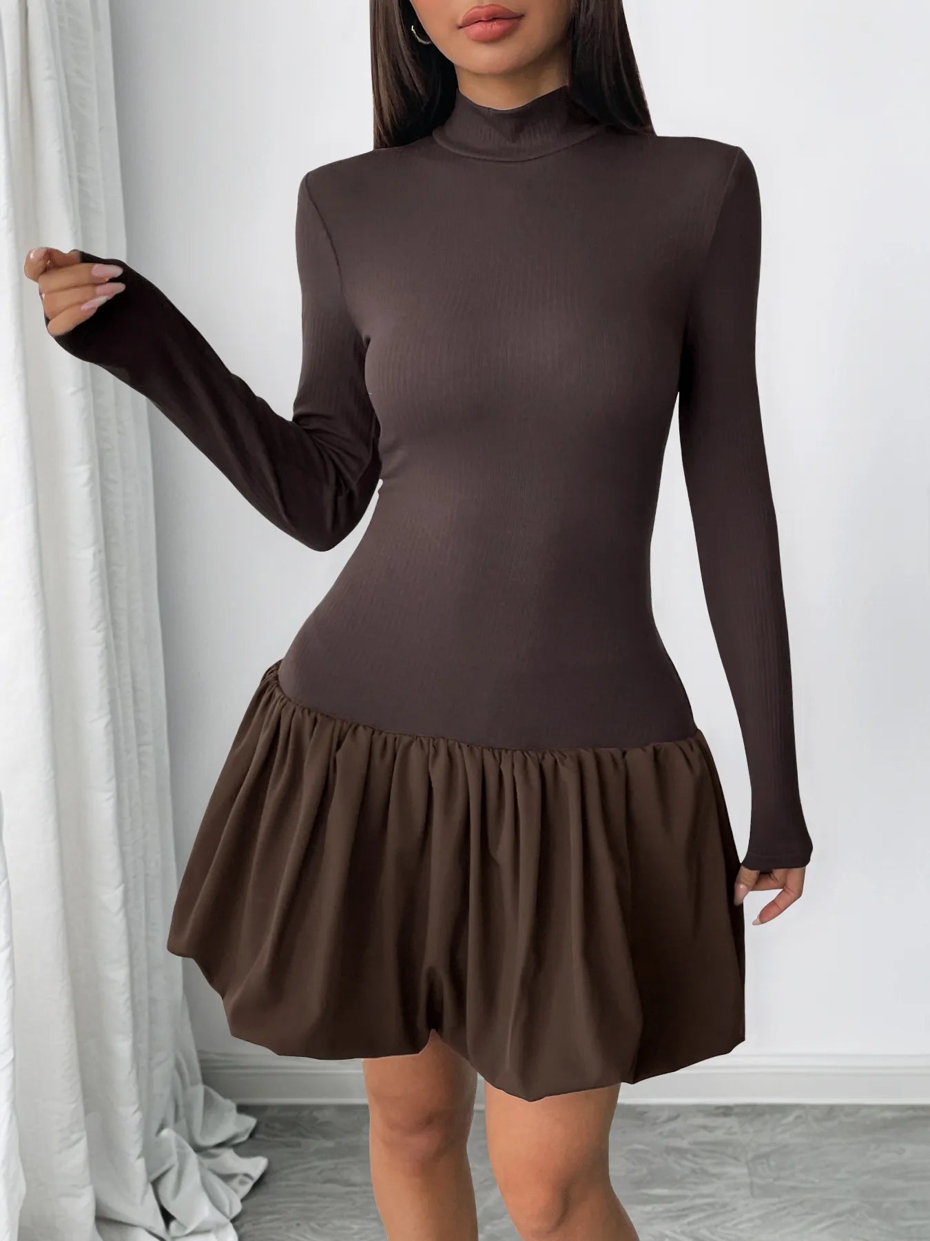 Brown bubble hem dress twirl pose – Voguelle
