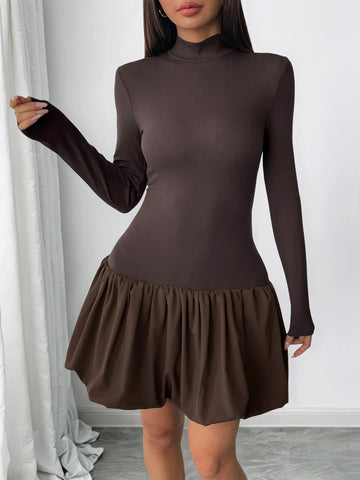 Brown bubble hem dress twirl pose – Voguelle