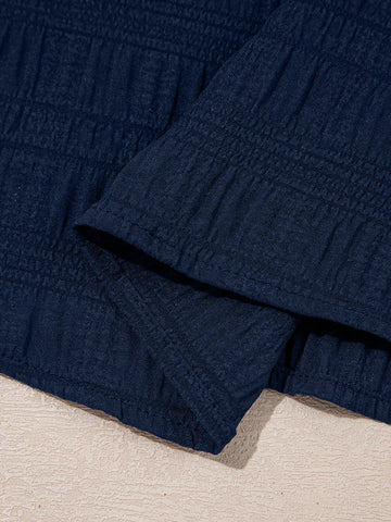 Close-up fabric texture of navy crop top and shorts set – Voguelle