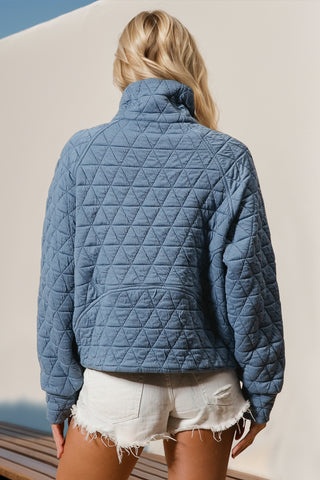 Model wearing rust quilted half zip sweatshirt – Voguelle