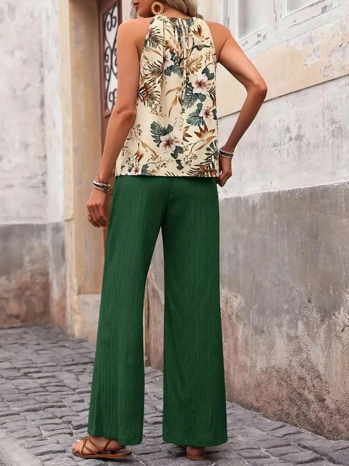 Side pose printed blouse with green wide leg trousers – Voguelle