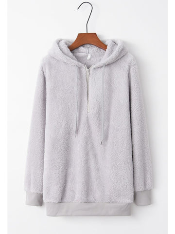 Side profile of model wearing teddy hoodie in brown – Voguelle