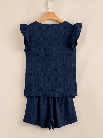 Back view of navy ruffled sleeve crop top and high waist shorts – Voguelle
