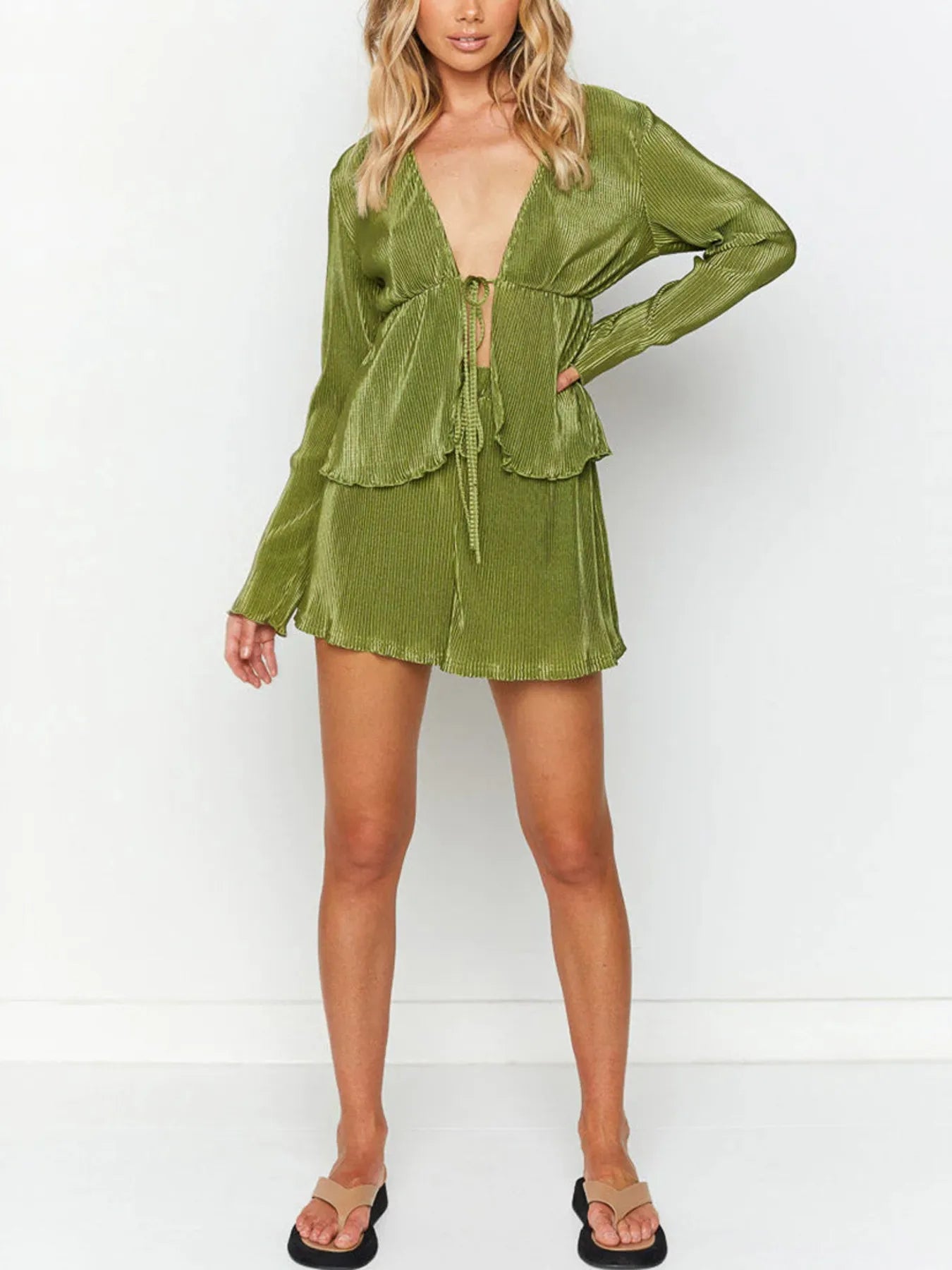 Front view of green long sleeve tie-front top and shorts set on model – Voguelle