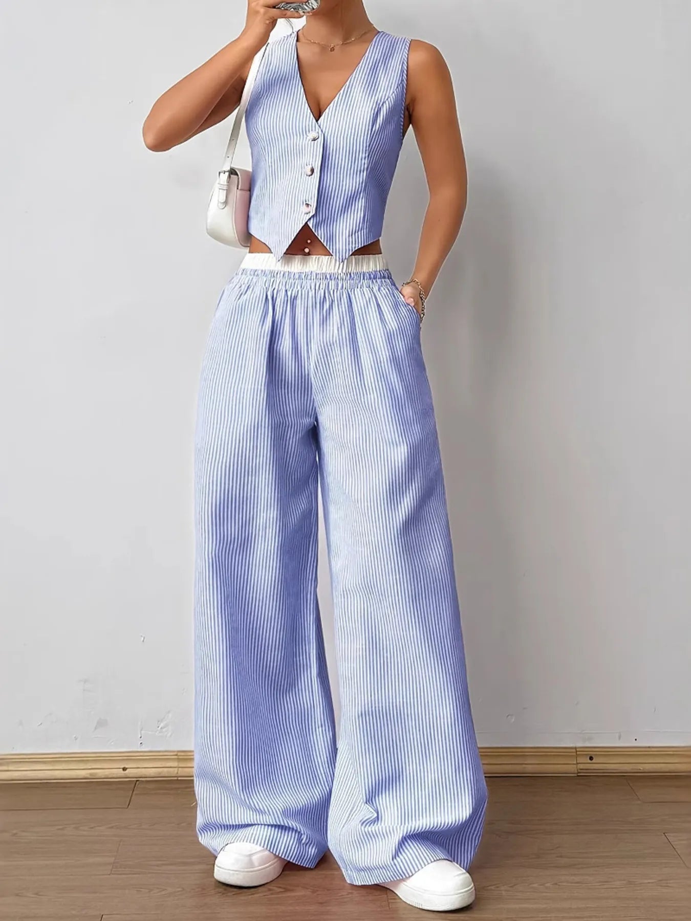 Full outfit shot striped vest co-ord with wide leg pants – Voguelle
