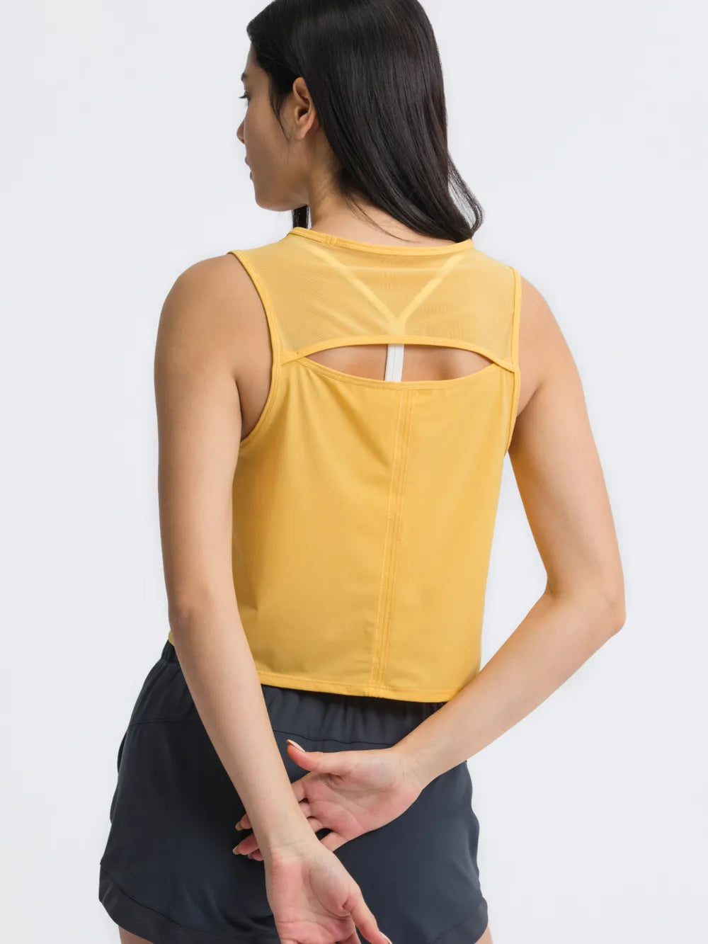 Back detail of Millennia Cropped Active Tank in yellow – Voguelle