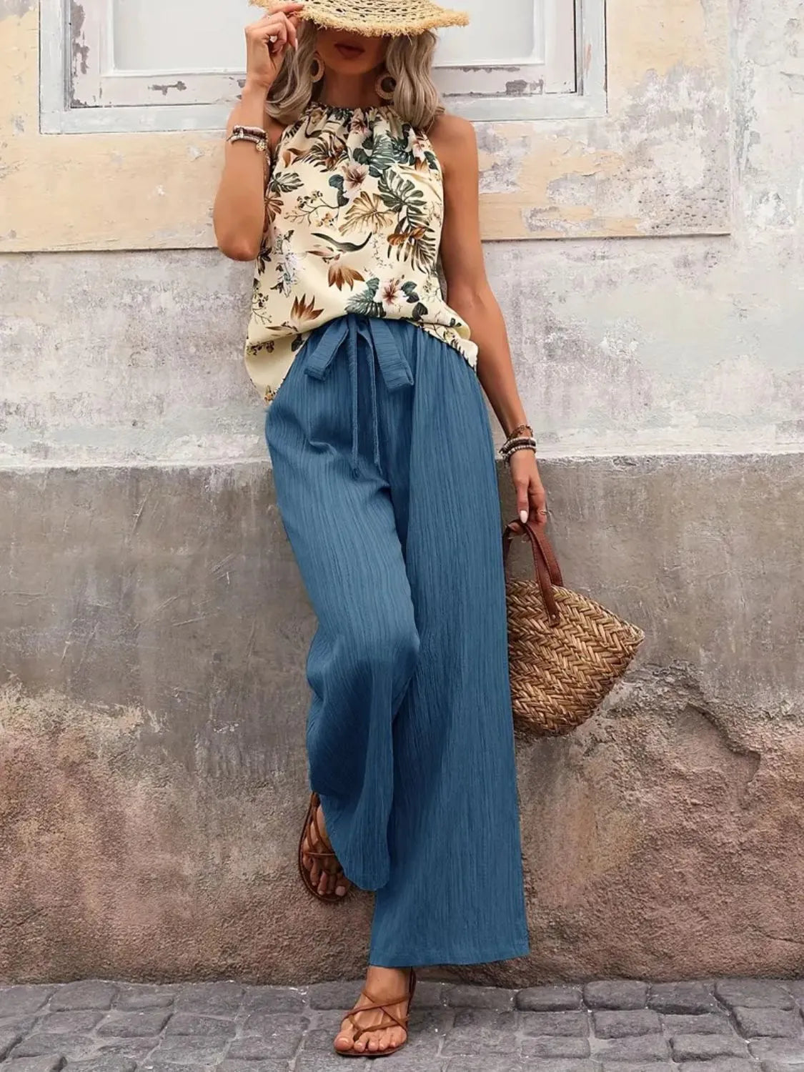 Side pose printed blouse with green wide leg trousers – Voguelle