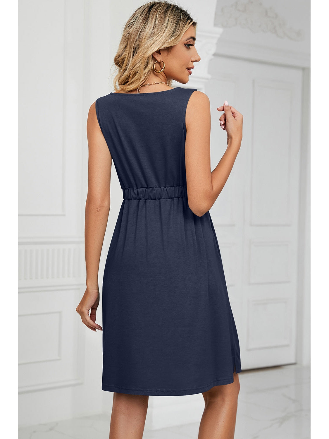 Model wearing navy Buttoned Mini Dress – Voguelle