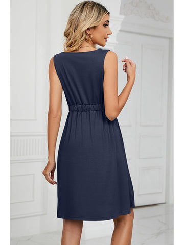 Model wearing navy Buttoned Mini Dress – Voguelle