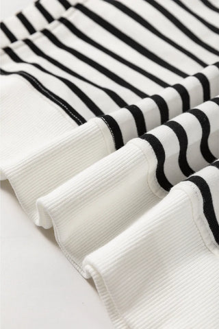 Model wearing striped round neck sweatshirt with side slit – Voguelle