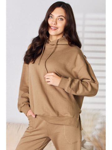 Front view of brown drawstring drop shoulder hoodie on model – Voguelle