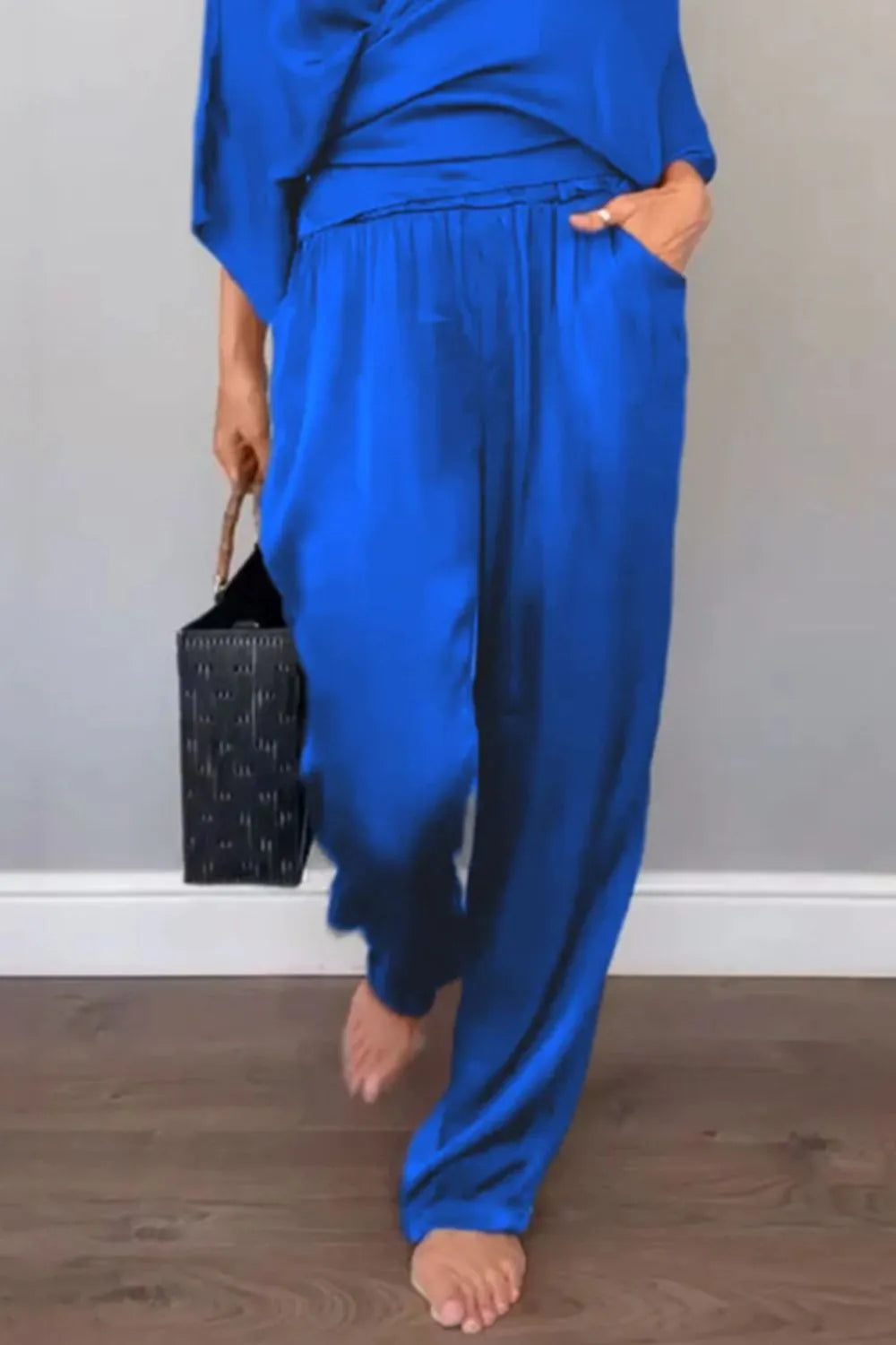 Comfortable casual black surplice wrap jumpsuit – Voguelle