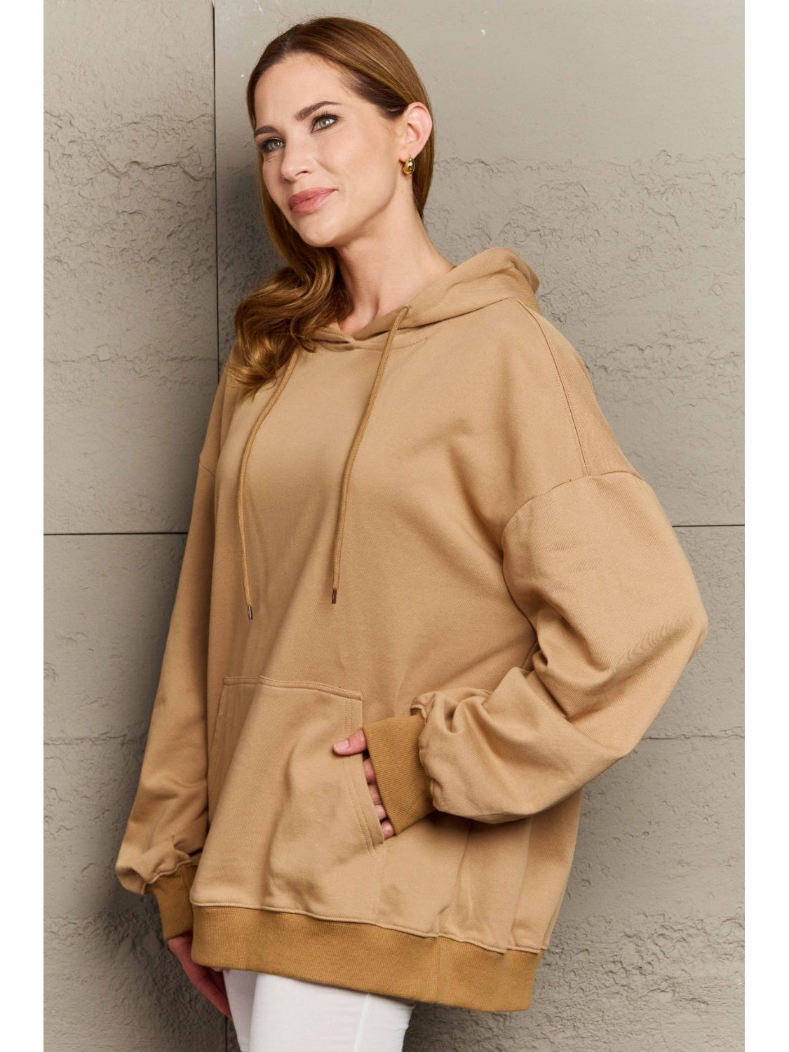 Model wearing camel long sleeve hoodie with drawstring – Voguelle
