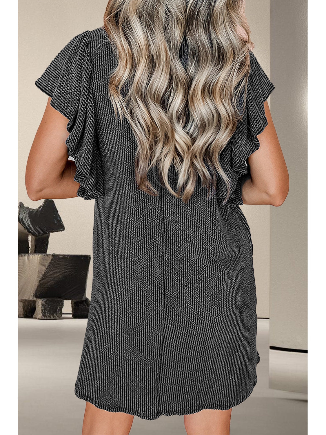 Front view of textured ruffled cap sleeve casual dress in teal – Voguelle