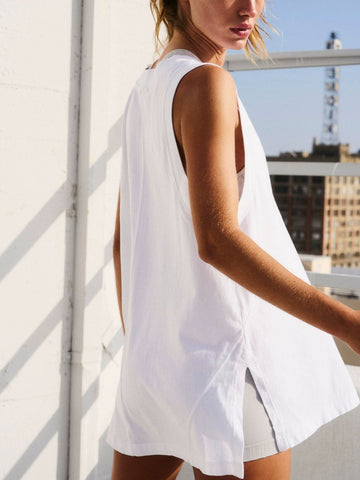 Front view of side slit V-neck tank top in white – Voguelle