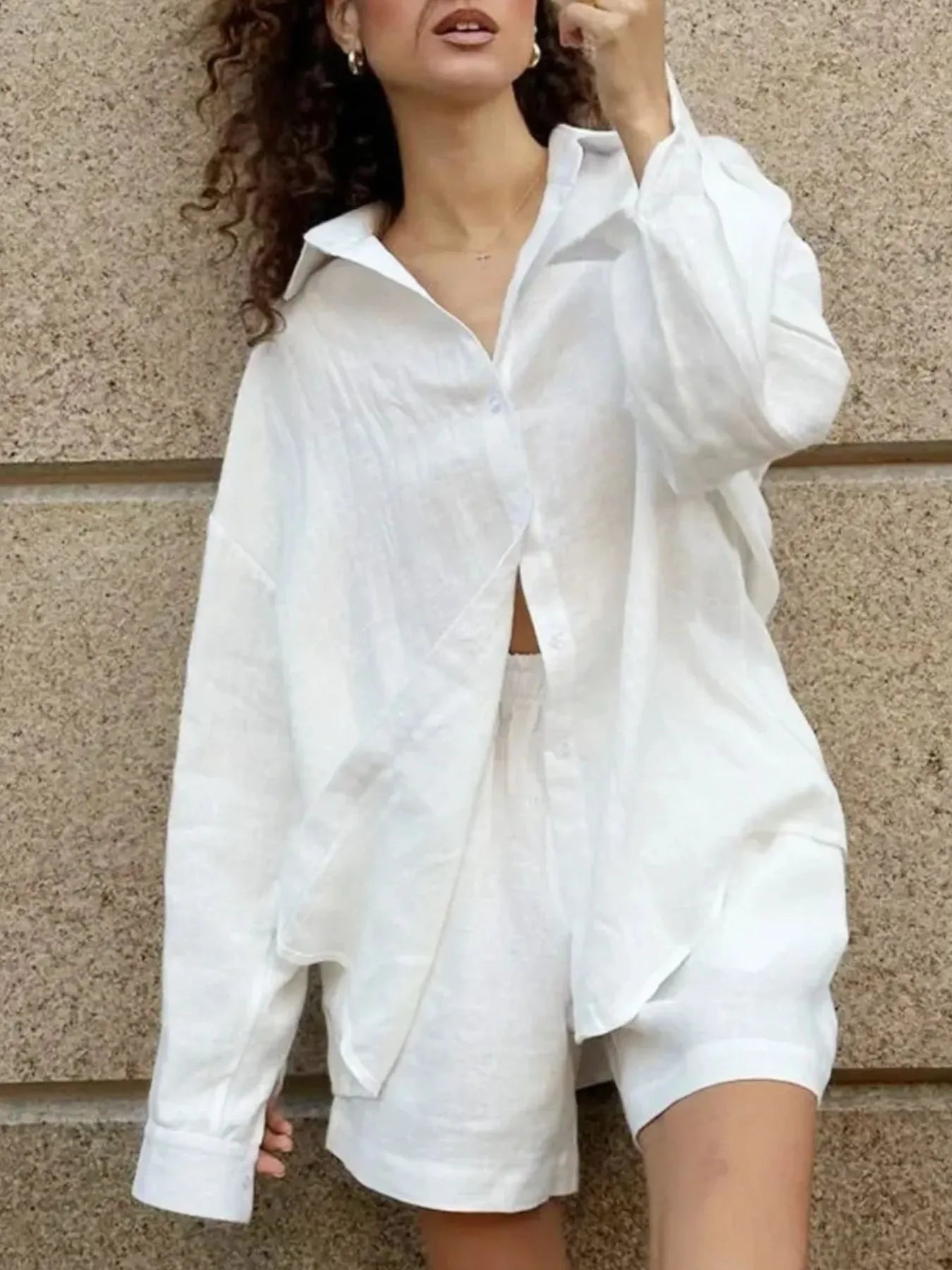 Back detail of long sleeve pink shirt with casual shorts – Voguelle
