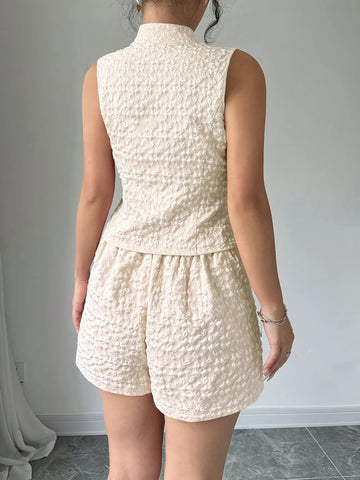Back view cream button-up vest with matching shorts – Voguelle